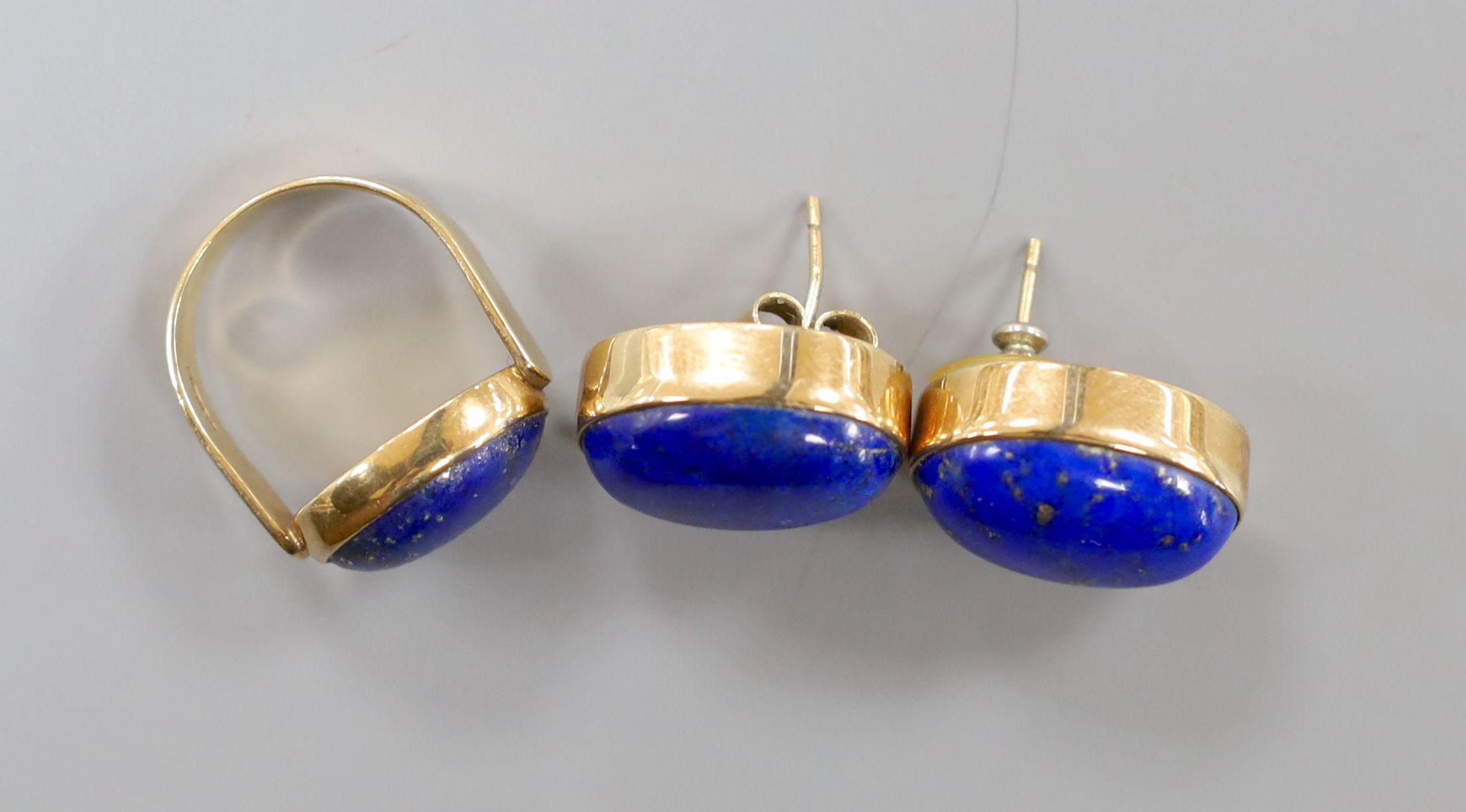 A pair of 9ct gold and lapis earrings, 21mm and a similar dress ring, size Q, gross weight, 27.2 grams.